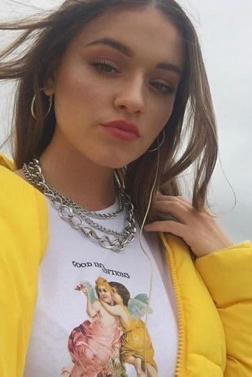Emily Middlemas wears our Petals & Peacocks T-Shirt - Spoiled Brat