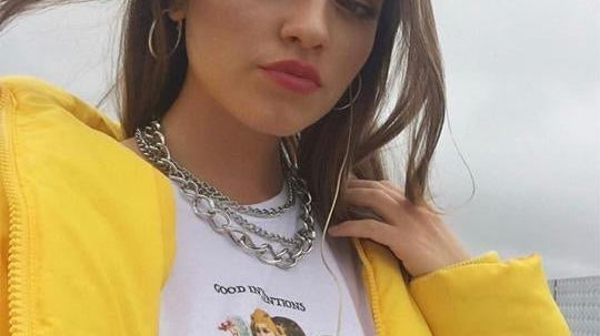 Emily Middlemas wears our Petals & Peacocks T-Shirt - Spoiled Brat