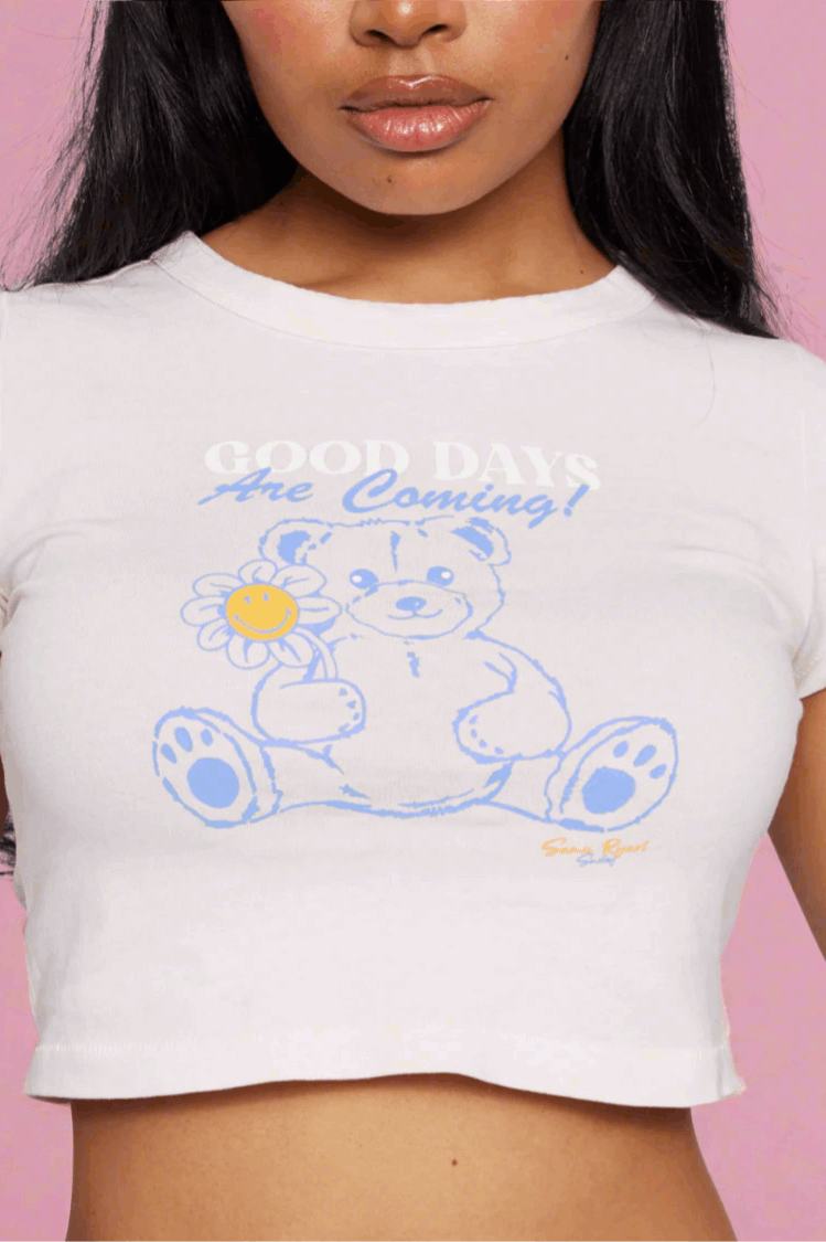 Samii Ryan x Smileyworld® Good Days Baby Tee T-Shirt by Samii Ryan as seen on celebrities