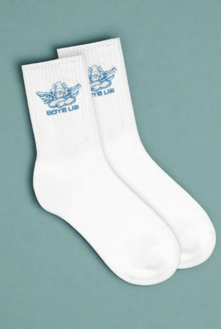 White socks with blue logo on a gray background