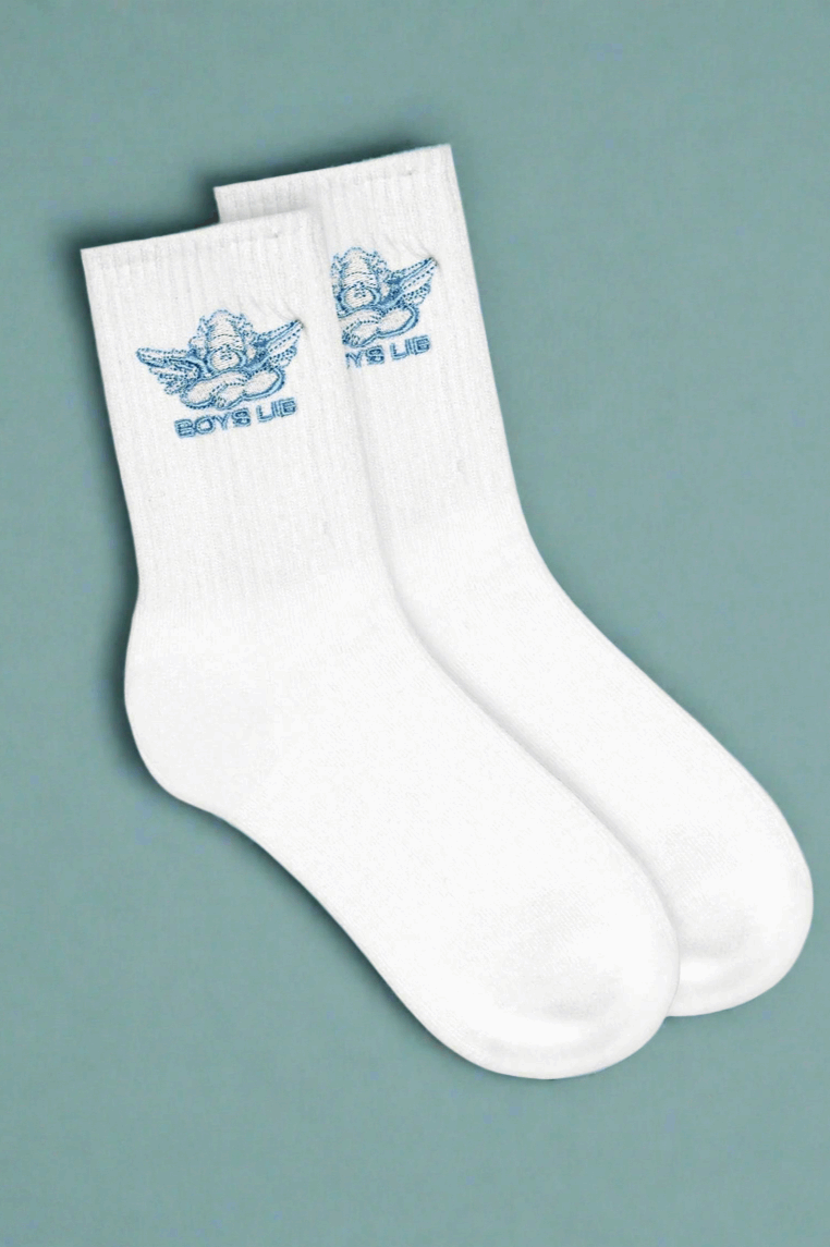 White socks with blue logo on a gray background