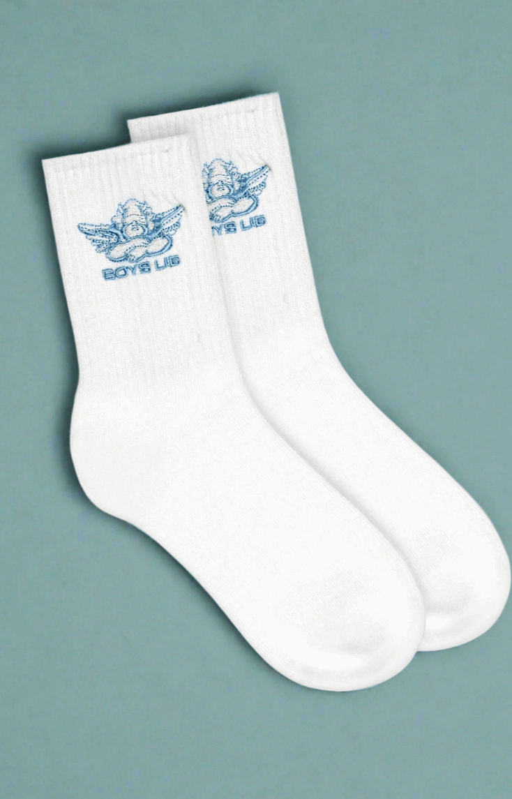 White socks with blue logo on a gray background
