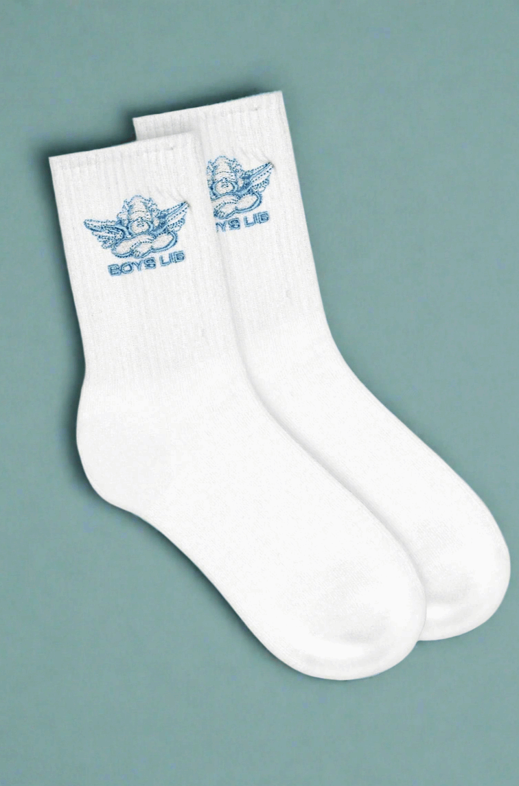 White socks with blue logo on a gray background