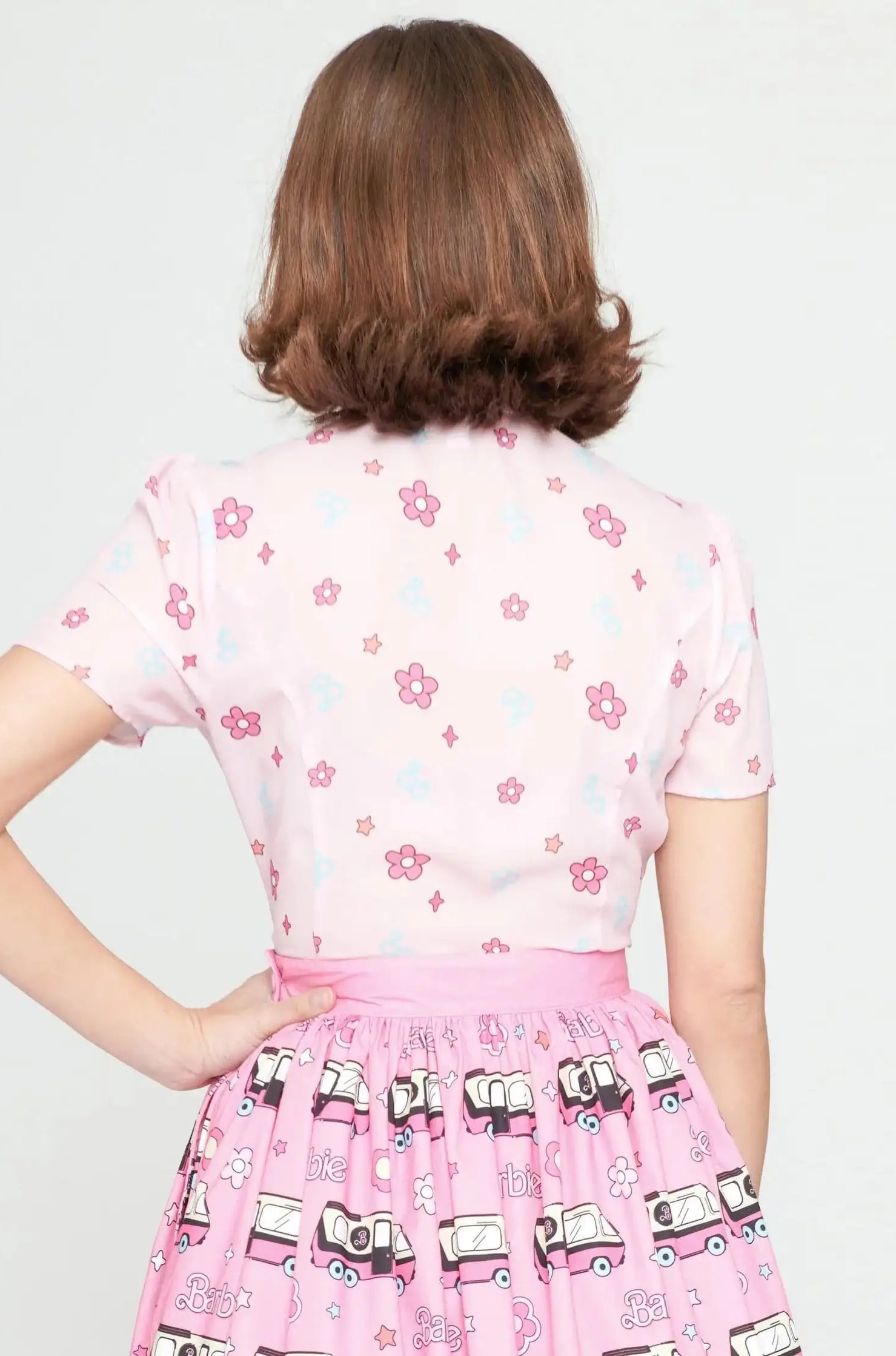 Barbie X Unique Vintage 1970s Pink Barbie Floral Print Bow Blouse Blouse by Unique Vintage as seen on celebrities