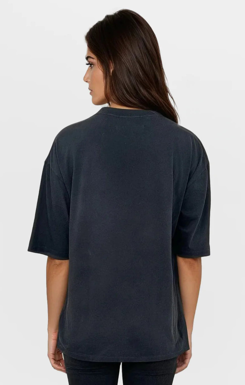 Person wearing a black t-shirt on a white background