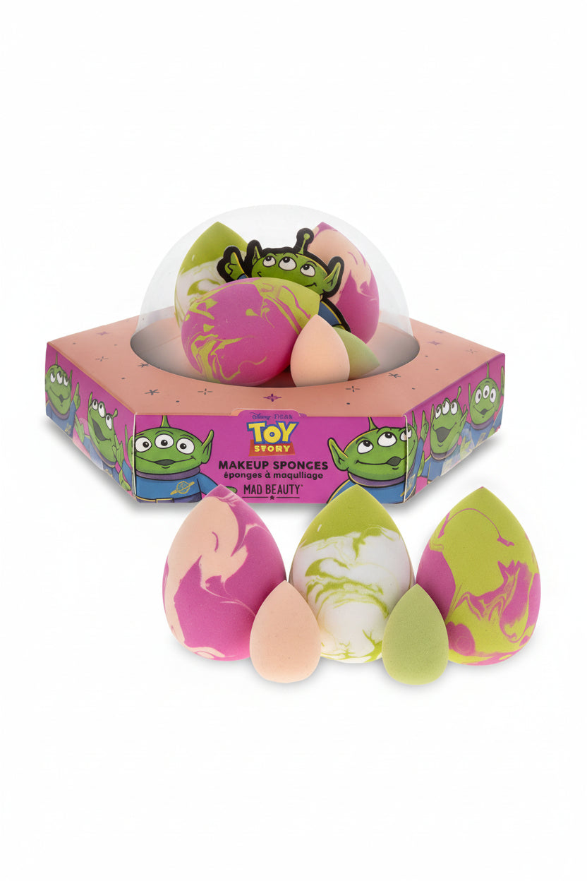 Makeup sponges with colorful designs in a 'Toy Story' themed box on a white background