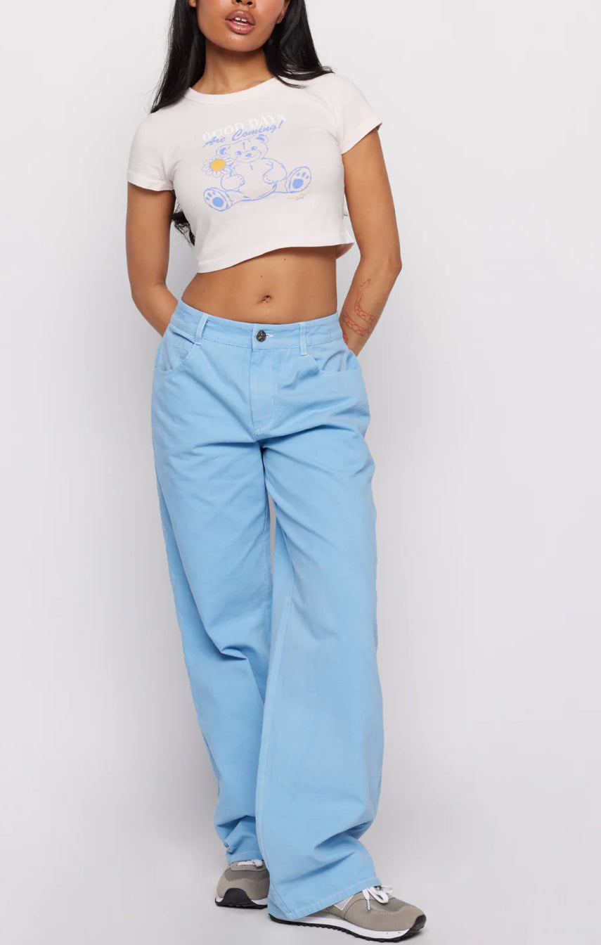 Samii Ryan x Smileyworld® Good Days Baby Tee T-Shirt by Samii Ryan as seen on celebrities