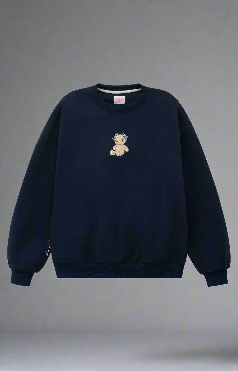 Navy blue sweatshirt with a teddy bear emblem on a light gray background
