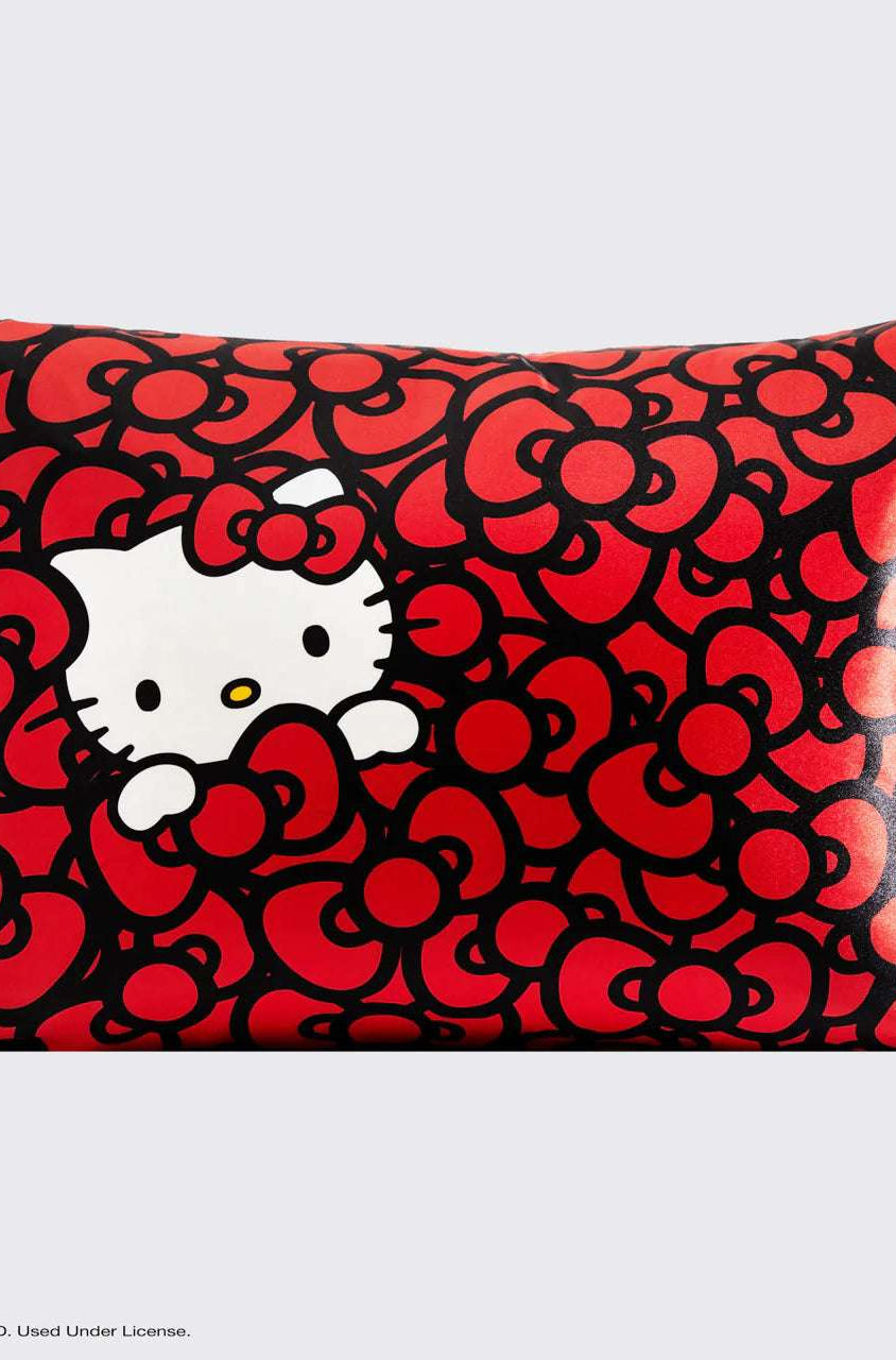 Hello Kitty x Kitsch Satin Pillowcase - Hello Kitty Bathes in a Sea of Bows Pillow by Kitsch as seen on celebrities