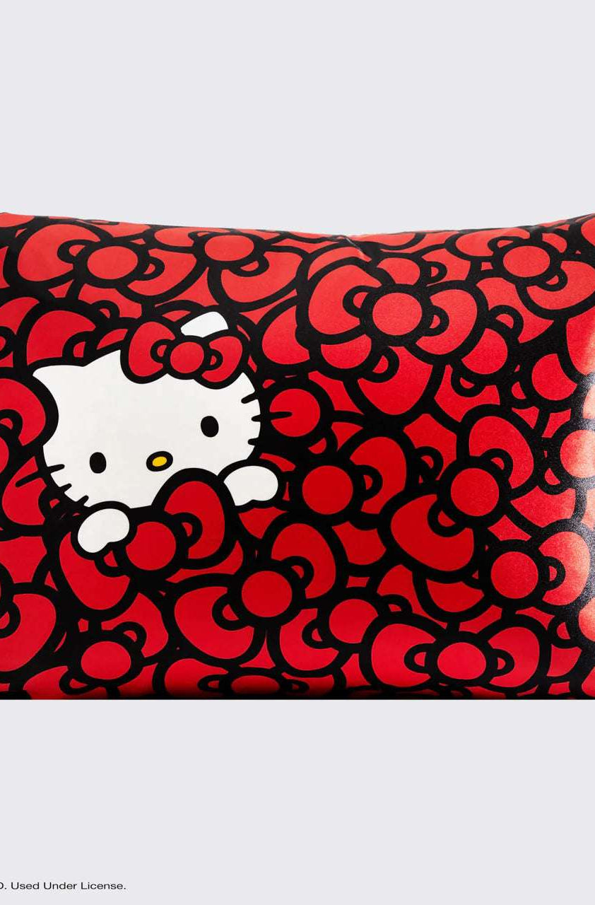 Hello Kitty x Kitsch Satin Pillowcase - Hello Kitty Bathes in a Sea of Bows Pillow by Kitsch as seen on celebrities