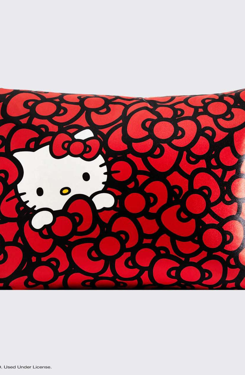 Hello Kitty x Kitsch Satin Pillowcase - Hello Kitty Bathes in a Sea of Bows Pillow by Kitsch as seen on celebrities