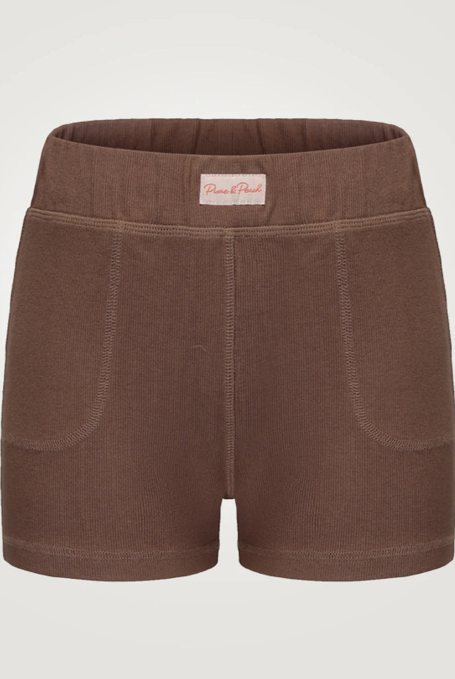 Brown shorts with a visible brand label on a light gray background