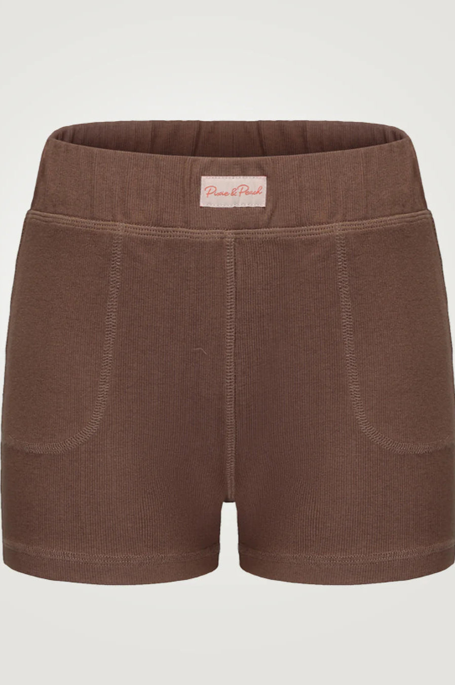 Brown shorts with a visible brand label on a light gray background