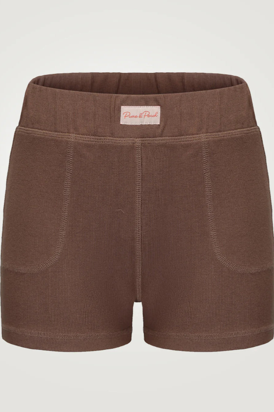 Brown shorts with a visible brand label on a light gray background