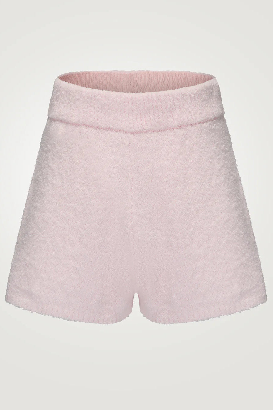 Pink shorts on a light gray background