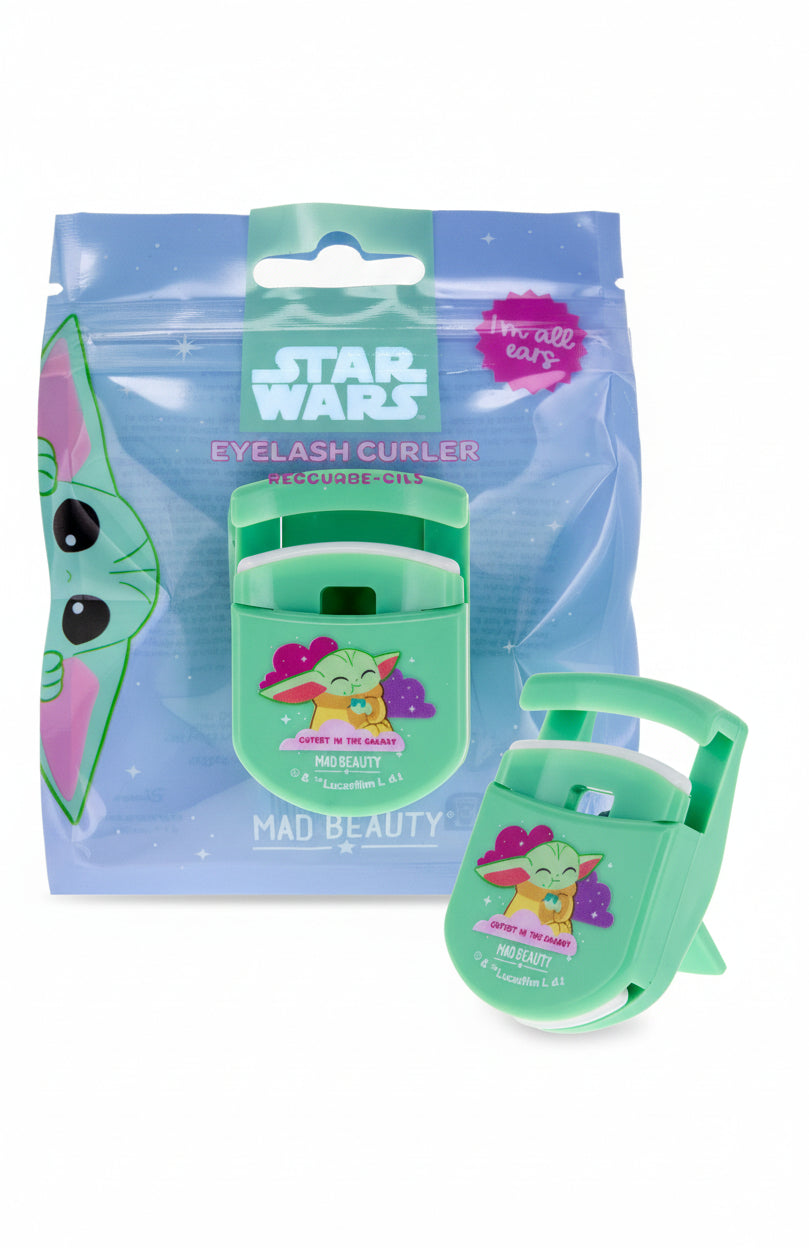 Green eyelash curler with 'Star Wars' branding and packaging on a white background