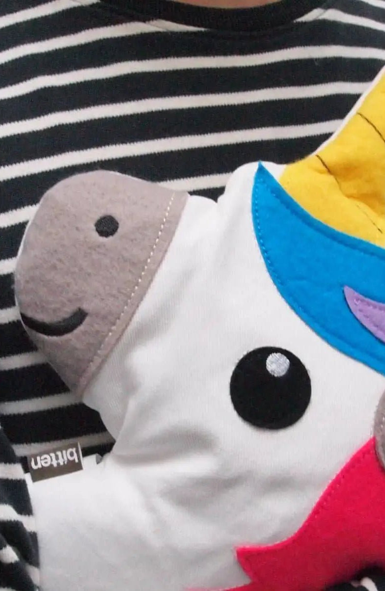 Shop Bitten Bitten Design Huggable Unicorn Head Hot Water Bottle for women – premium loungewear and festival fashion at Spoiled Brat