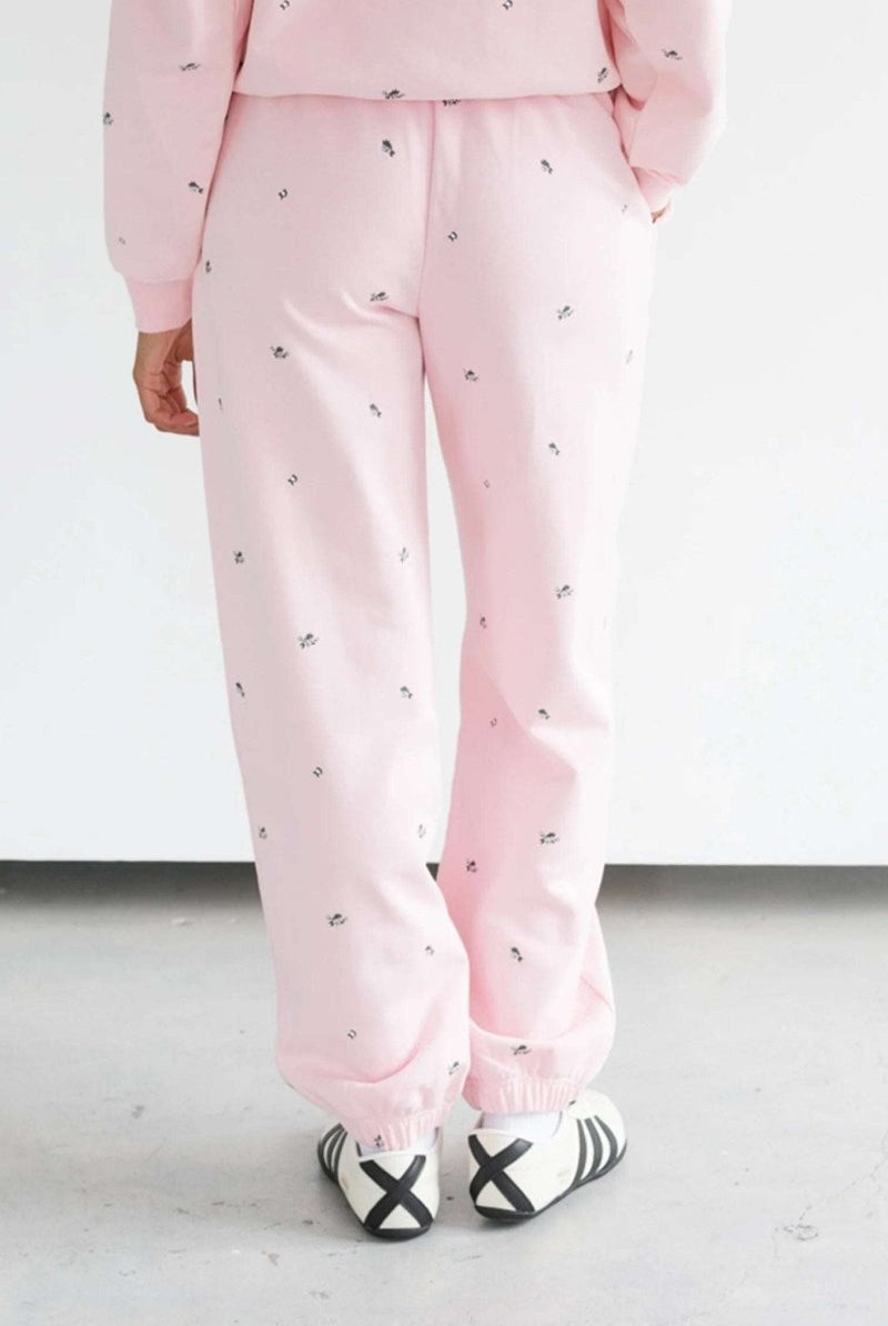 Shop Brunette The Label Brunette The Label "Be Kind" All Over Floral Oversized Joggers Sweatpants for women – premium loungewear and festival fashion at Spoiled Brat