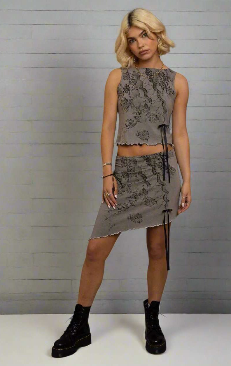 Shop Daisy Street Daisy Street Asymmetrical Skirt with Print & Bow Detail Mini Skirt for women – premium loungewear and festival fashion at Spoiled Brat