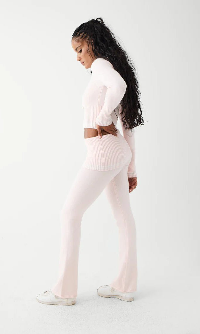 Shop Frankies Bikinis Frankies Bikinis Aimee Cloud Knit Flare Pant in Rosebud Pink Trousers for women – premium loungewear and festival fashion at Spoiled Brat