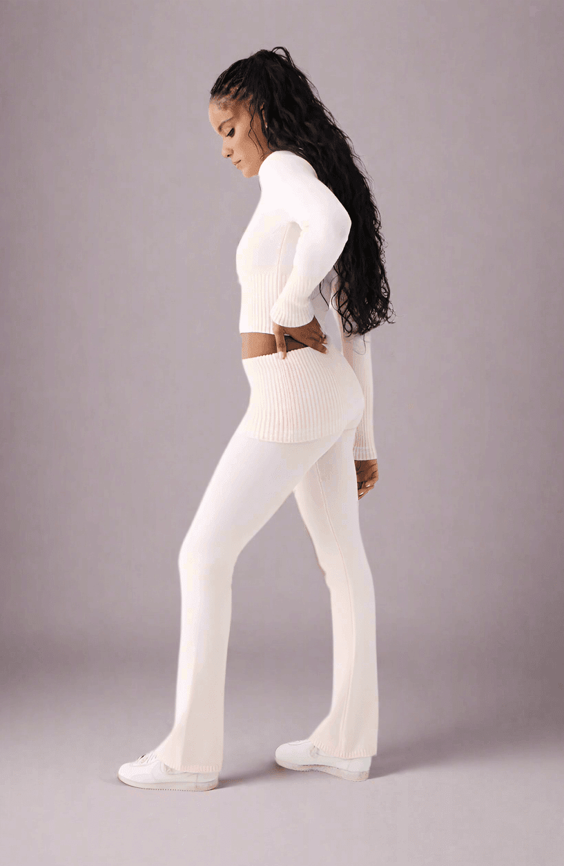 Shop Frankies Bikinis Frankies Bikinis Aimee Cloud Knit Flare Pant in Rosebud Pink Trousers for women – premium loungewear and festival fashion at Spoiled Brat