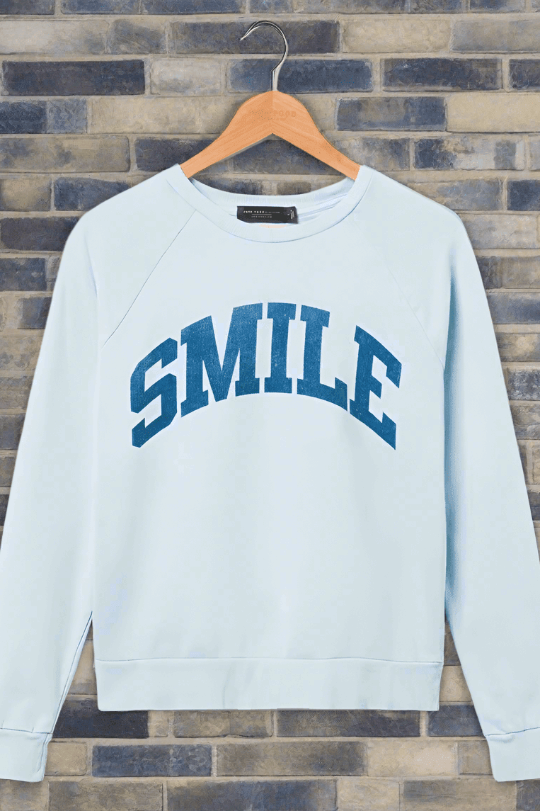 Shop Junk Food Junk Food Womens Smile Vintage Raglan Pullover T-Shirt for women – premium loungewear and festival fashion at Spoiled Brat