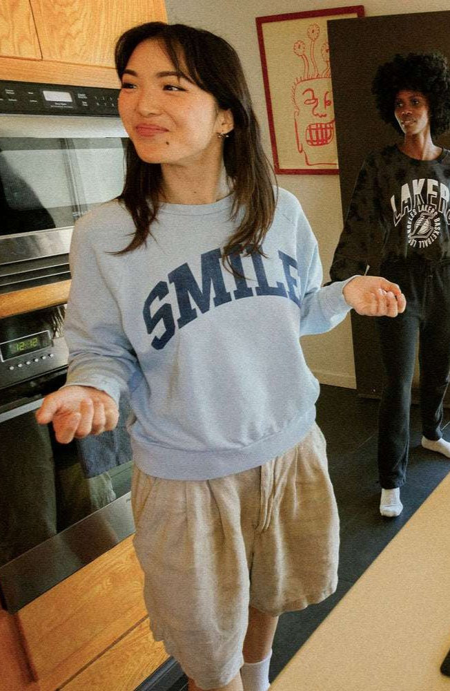 Shop Junk Food Junk Food Womens Smile Vintage Raglan Pullover T-Shirt for women – premium loungewear and festival fashion at Spoiled Brat