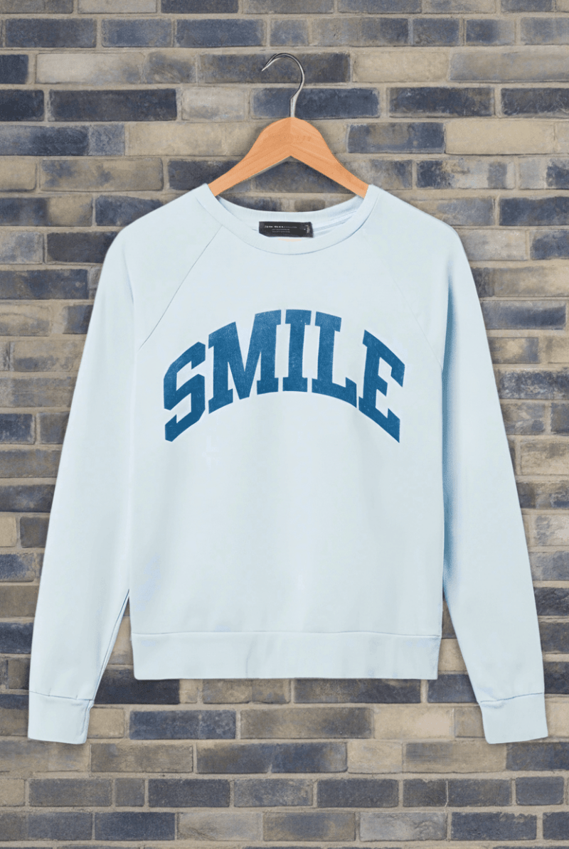 Shop Junk Food Junk Food Womens Smile Vintage Raglan Pullover T-Shirt for women – premium loungewear and festival fashion at Spoiled Brat