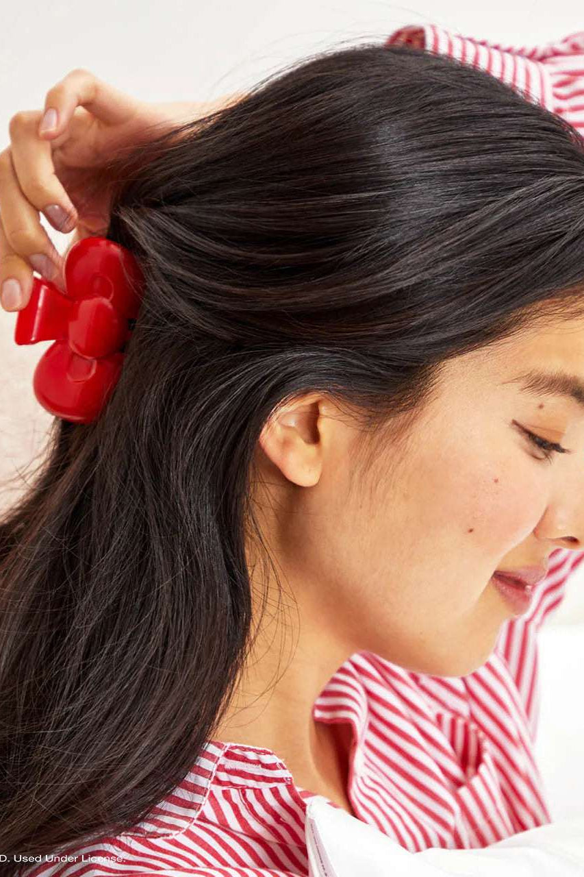 Shop Kitsch Hello Kitty x Kitsch Recycled Plastic Bow Shape Claw Clip Hair Band for women – premium loungewear and festival fashion at Spoiled Brat