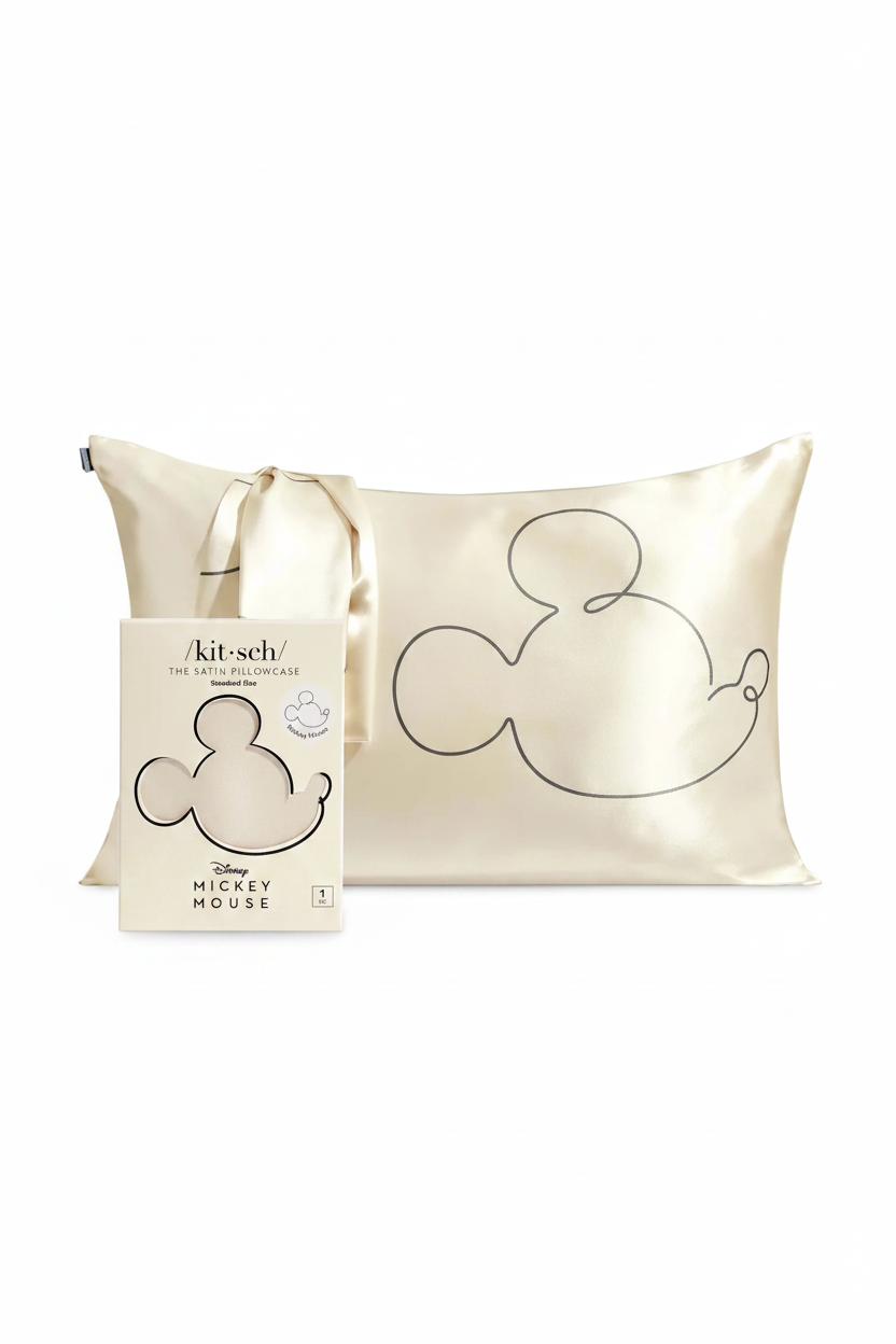 Cushion with Mickey Mouse design and matching tote bag on a white background