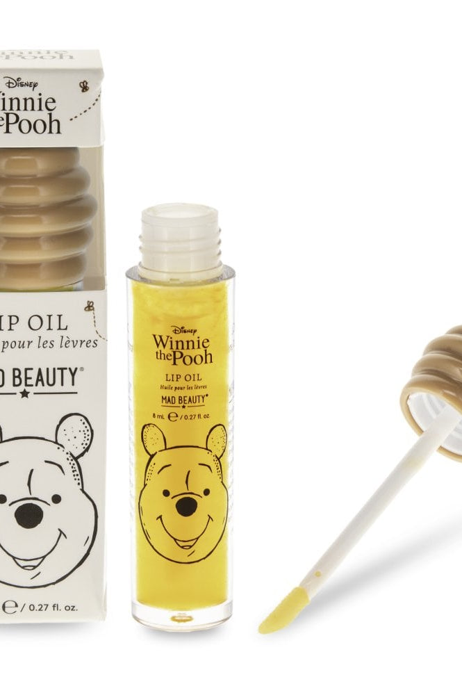 Shop Mad Beauty Mad Beauty Winnie The Pooh Lip Oil Lip Gloss for women – premium loungewear and festival fashion at Spoiled Brat