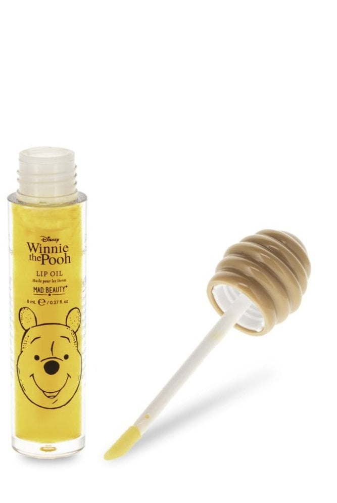 Shop Mad Beauty Mad Beauty Winnie The Pooh Lip Oil Lip Gloss for women – premium loungewear and festival fashion at Spoiled Brat