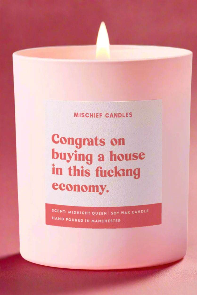 Mischief Candles New Home Gift Funny Housewarming Candle A House in This Economy by Mischief Candles – Candles – Pink | Spoiled Brat UK