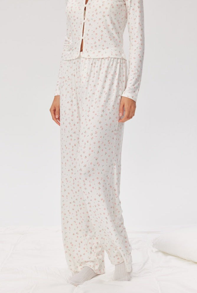 Shop Pixie and Peach Pixie & Peach Peachy Floral Trousers Trousers for women – premium loungewear and festival fashion at Spoiled Brat