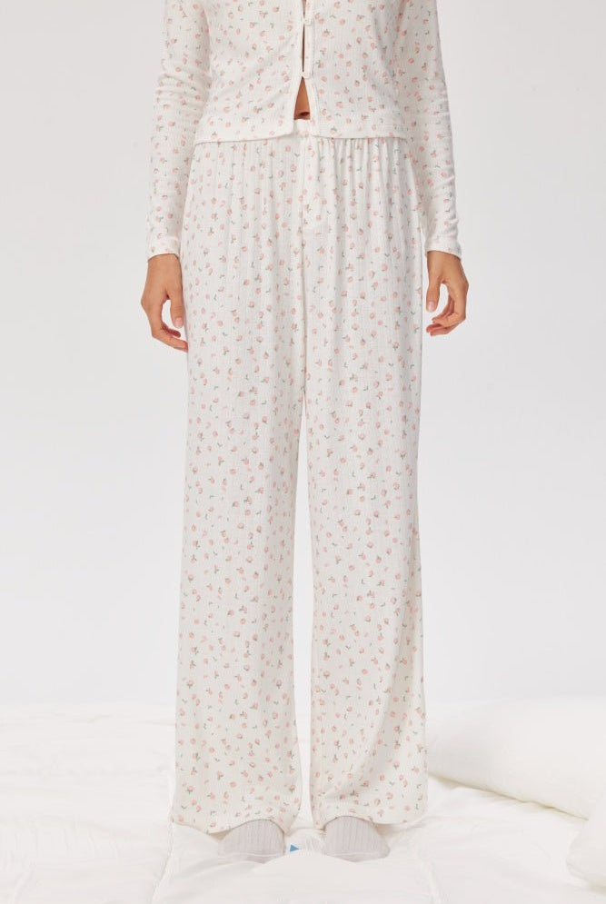 Shop Pixie and Peach Pixie & Peach Peachy Floral Trousers Trousers for women – premium loungewear and festival fashion at Spoiled Brat