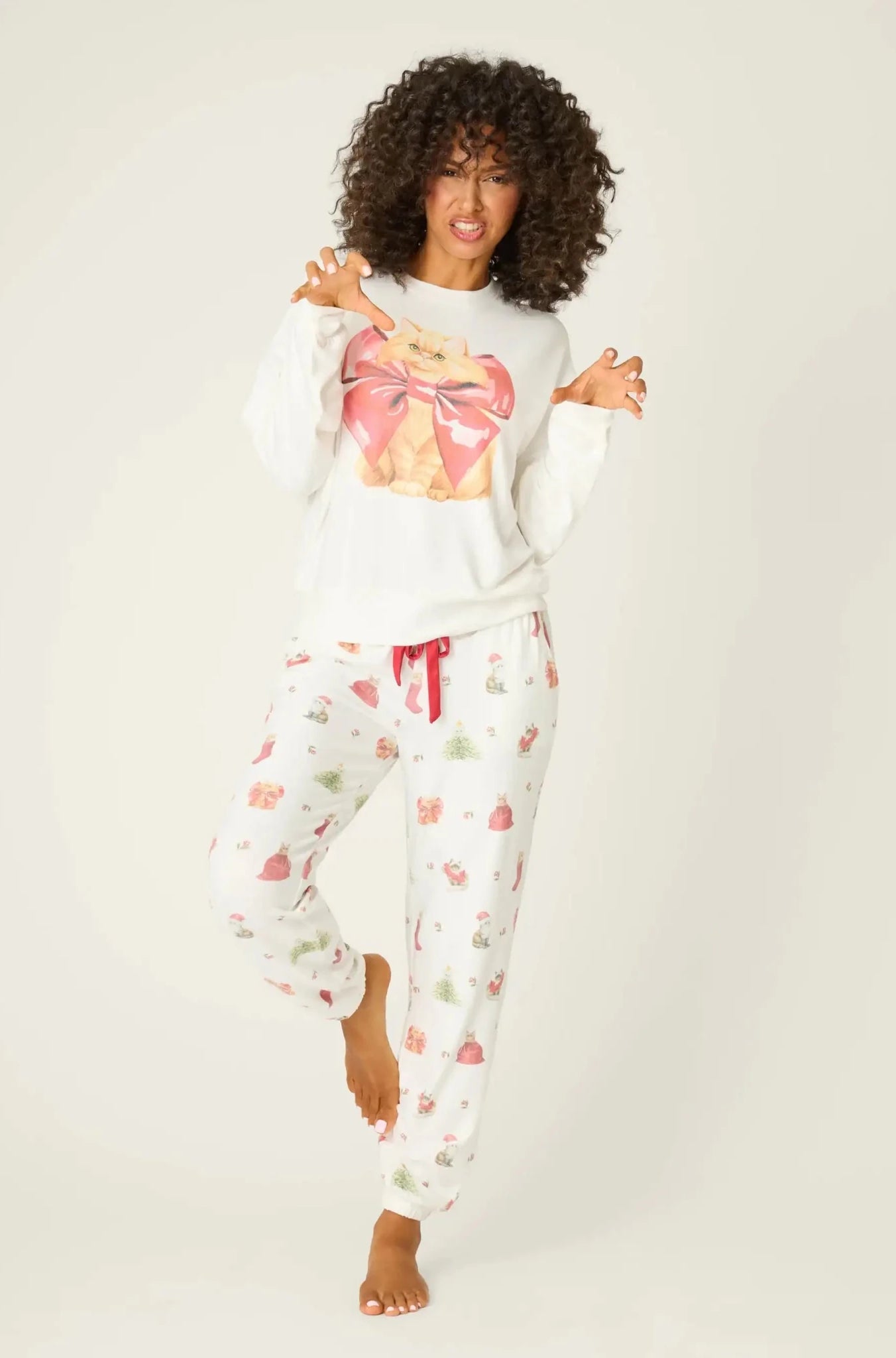 Shop PJ Salvage PJ Salvage Feline Festive Cat Print Sweater as seen on Chloe Sims Sweater for women – premium loungewear and festival fashion at Spoiled Brat