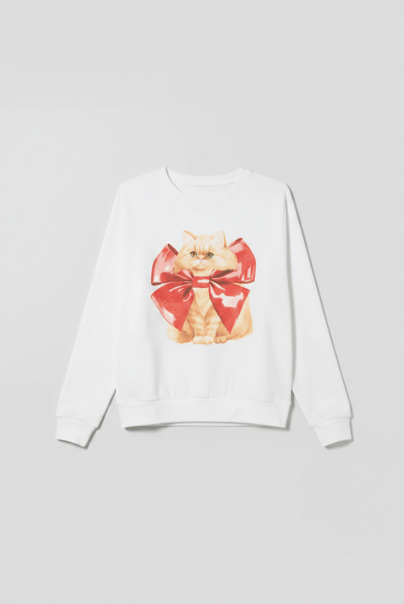 Shop PJ Salvage PJ Salvage Feline Festive Cat Print Sweater as seen on Chloe Sims Sweater for women – premium loungewear and festival fashion at Spoiled Brat