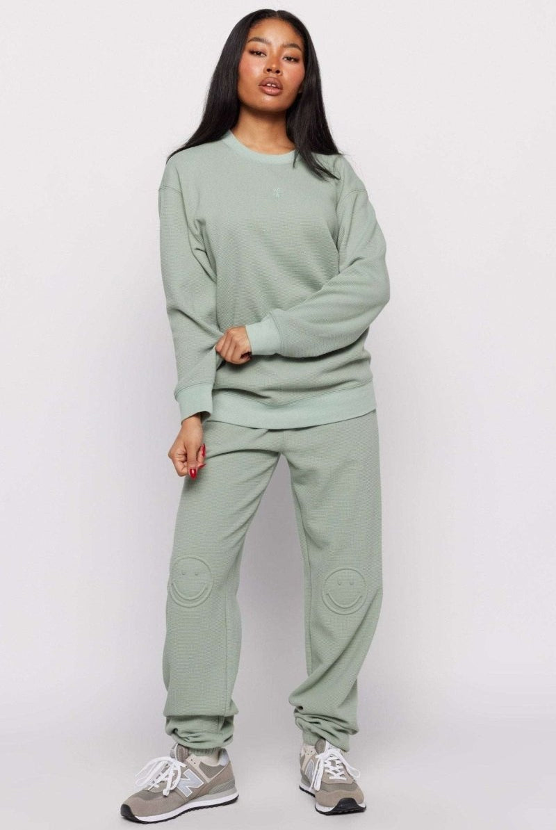 Shop Samii Ryan Samii Ryan Smiley® Thermal Crewneck Sweatshirt for women – premium loungewear and festival fashion at Spoiled Brat