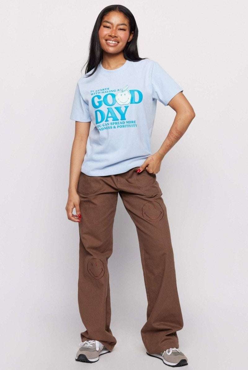 Shop Samii Ryan Samii Ryan x Smiley® Good Day Boxy Tee T-Shirt for women – premium loungewear and festival fashion at Spoiled Brat