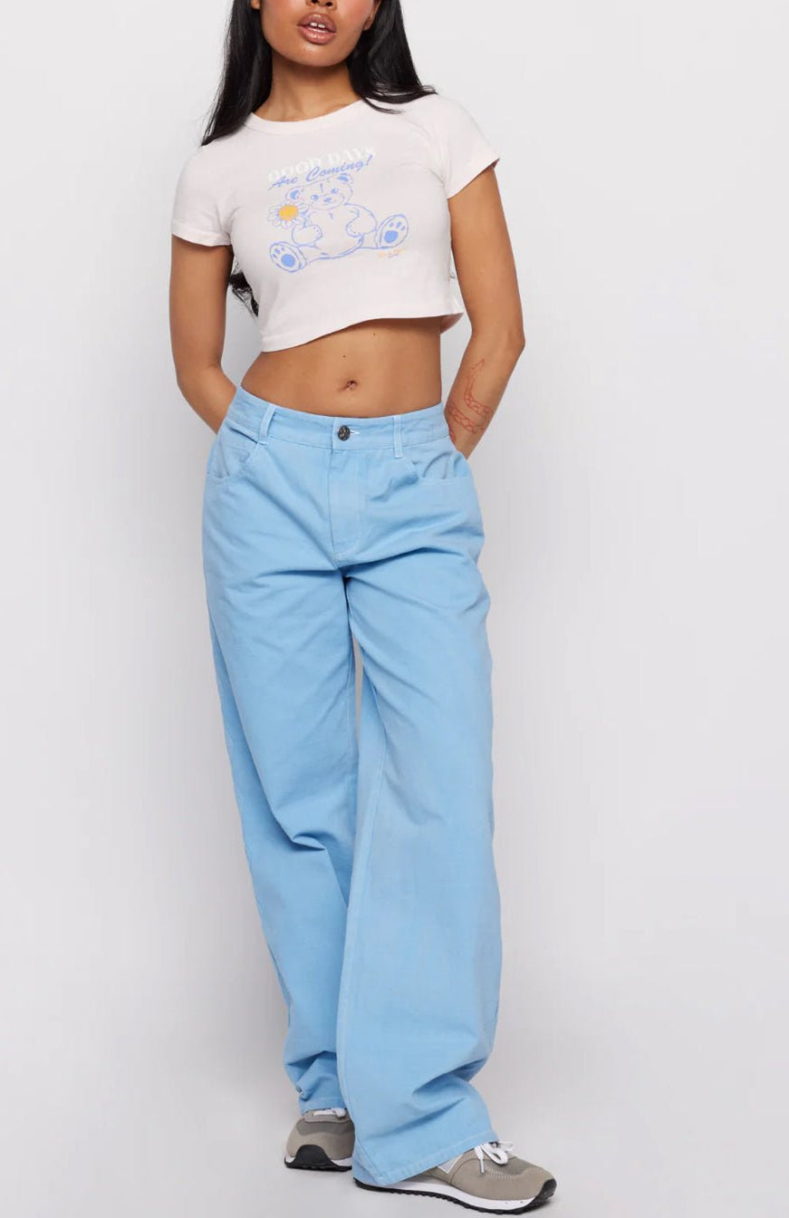 Shop Samii Ryan Samii Ryan x Smileyworld® Good Days Baby Tee T-Shirt for women – premium loungewear and festival fashion at Spoiled Brat