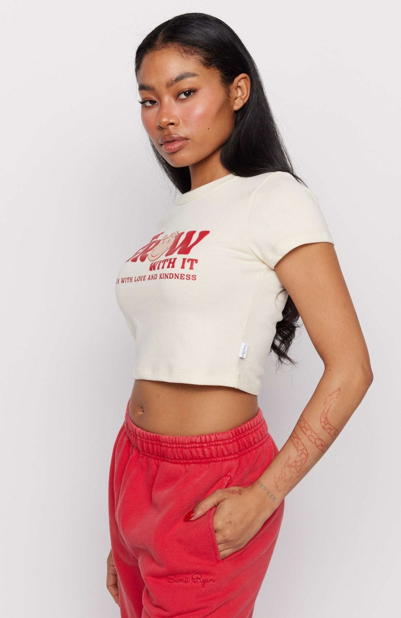 Shop Samii Ryan Samii Ryan x Smileyworld® Just Grow With It Baby Tee T-Shirt for women – premium loungewear and festival fashion at Spoiled Brat