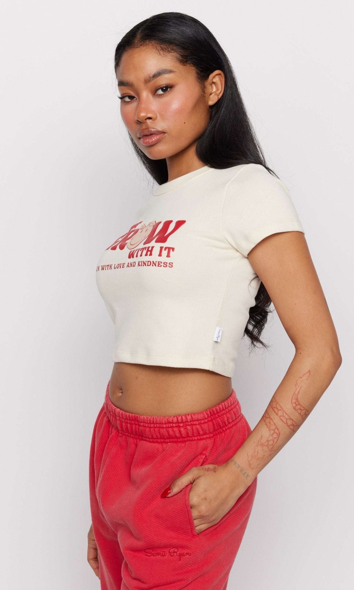 Shop Samii Ryan Samii Ryan x Smileyworld® Just Grow With It Baby Tee T-Shirt for women – premium loungewear and festival fashion at Spoiled Brat