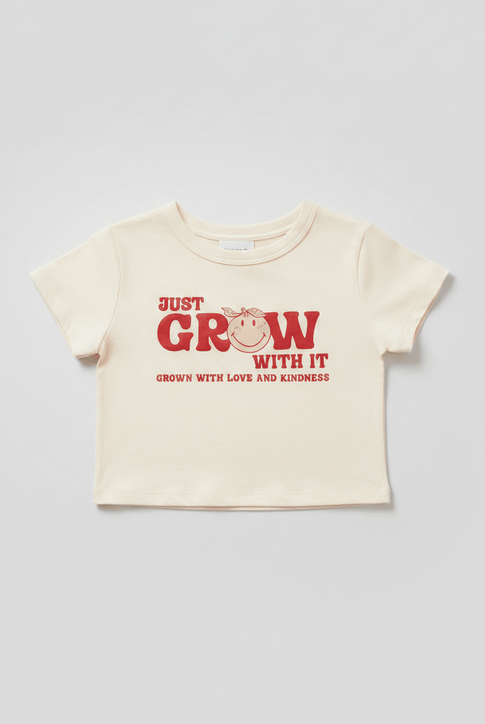 Shop Samii Ryan Samii Ryan x Smileyworld® Just Grow With It Baby Tee T-Shirt for women – premium loungewear and festival fashion at Spoiled Brat
