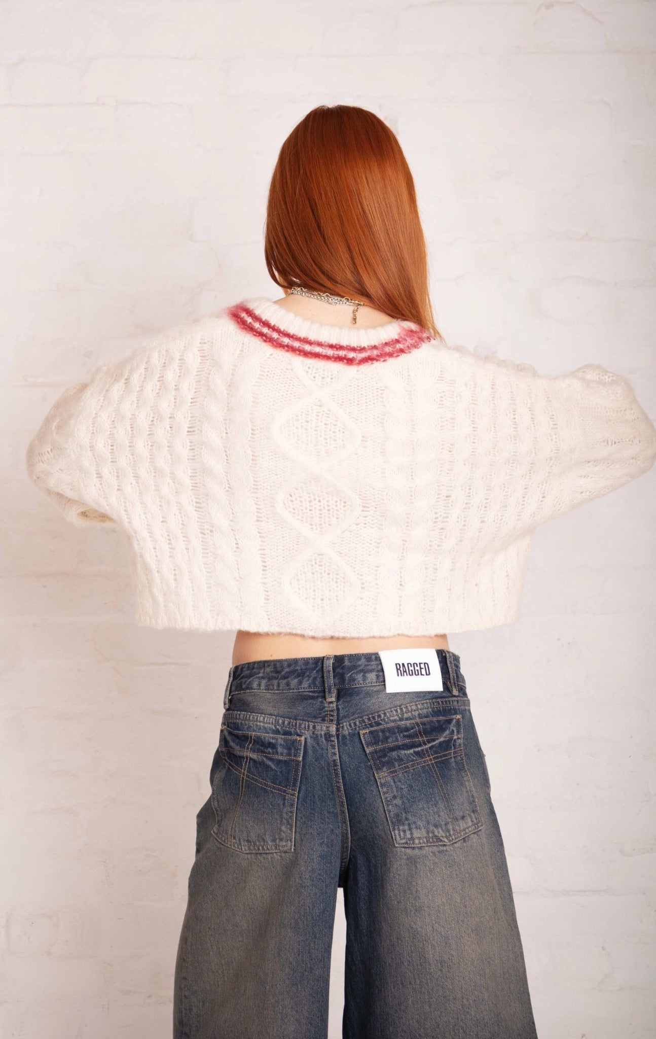 Shop The Ragged Priest The Ragged Priest Load Varsity Crop Cable Knit Jumper Jumper for women – premium loungewear and festival fashion at Spoiled Brat