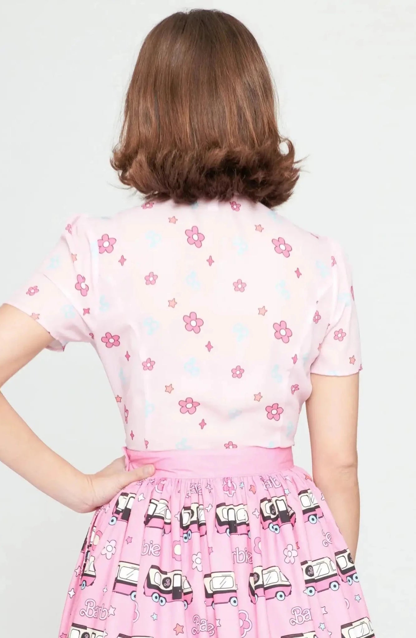 Shop Unique Vintage Barbie X Unique Vintage 1970s Pink Barbie Floral Print Bow Blouse Blouse for women – premium loungewear and festival fashion at Spoiled Brat