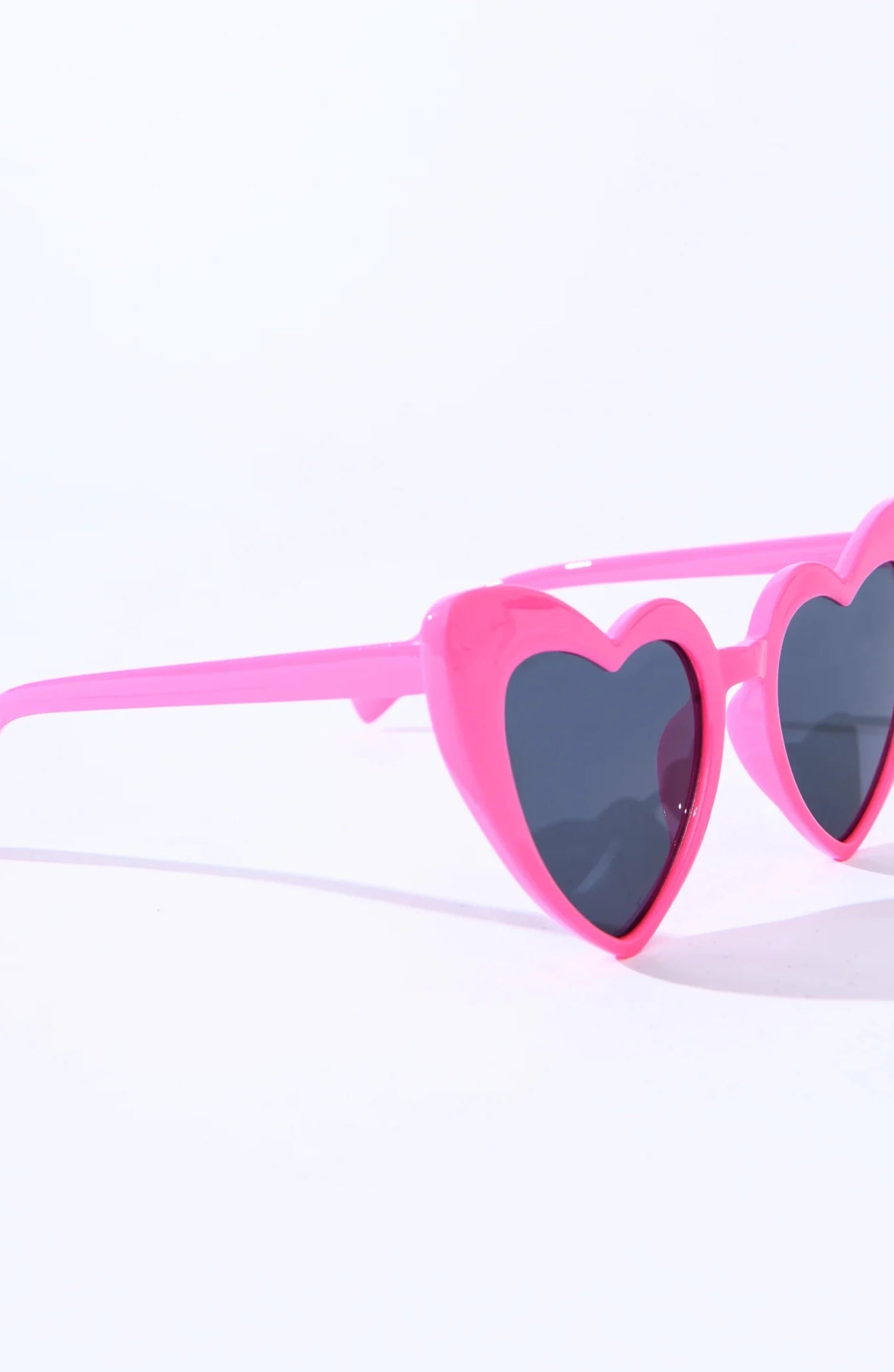 Shop Unique Vintage Unique Vintage x Barbie Hot Pink Heart Frame Sunglasses Sunglasses for women – premium loungewear and festival fashion at Spoiled Brat