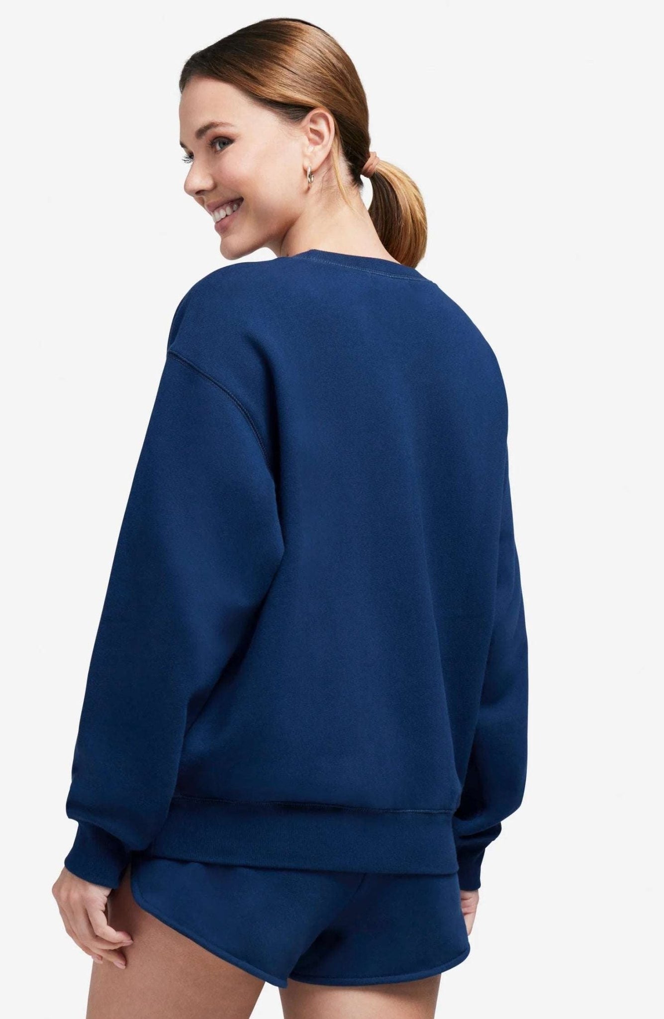 Shop Wildfox Wildfox 90s Crest Cody Sweatshirt Jumper for women – premium loungewear and festival fashion at Spoiled Brat