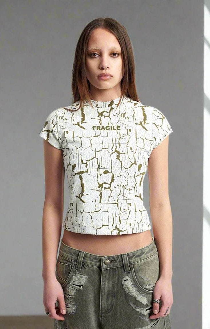 The Ragged Priest Rift Baby Tee Top by The Ragged Priest as seen on celebrities