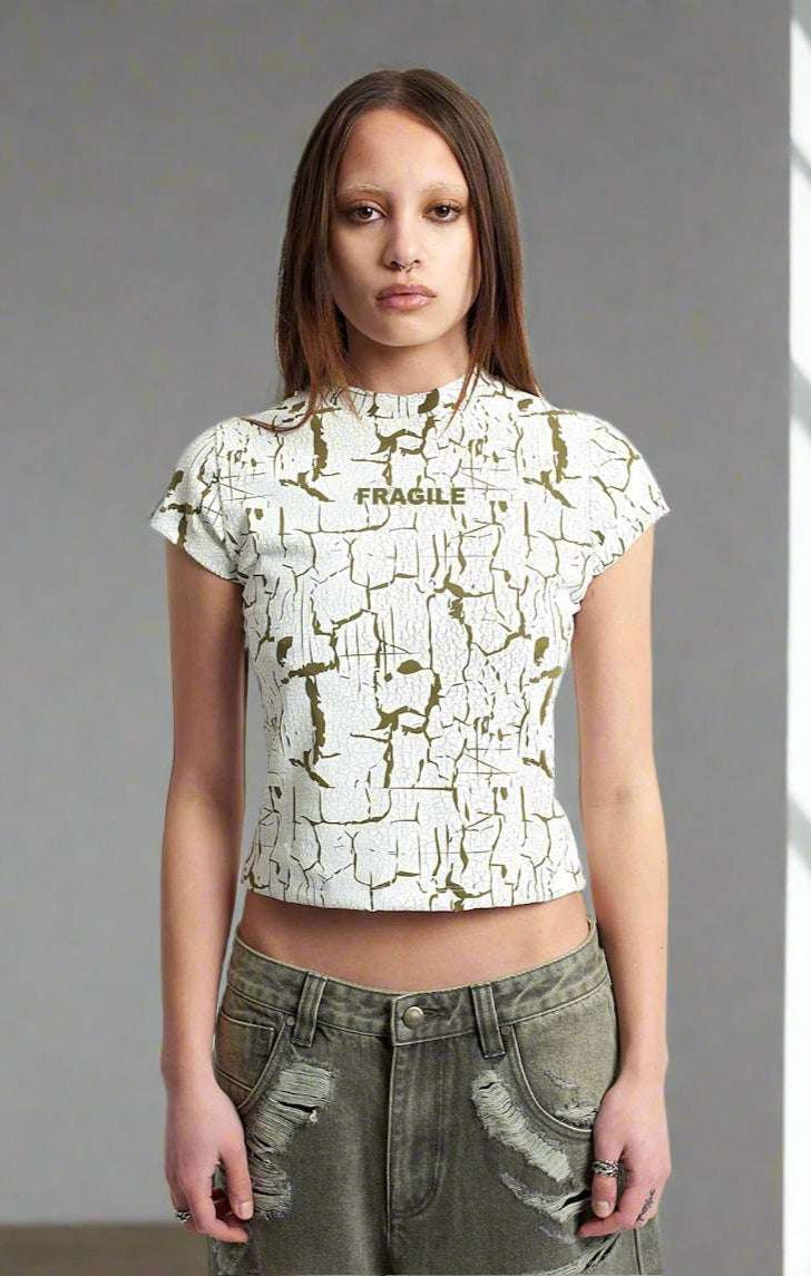 The Ragged Priest Rift Baby Tee Top by The Ragged Priest as seen on celebrities