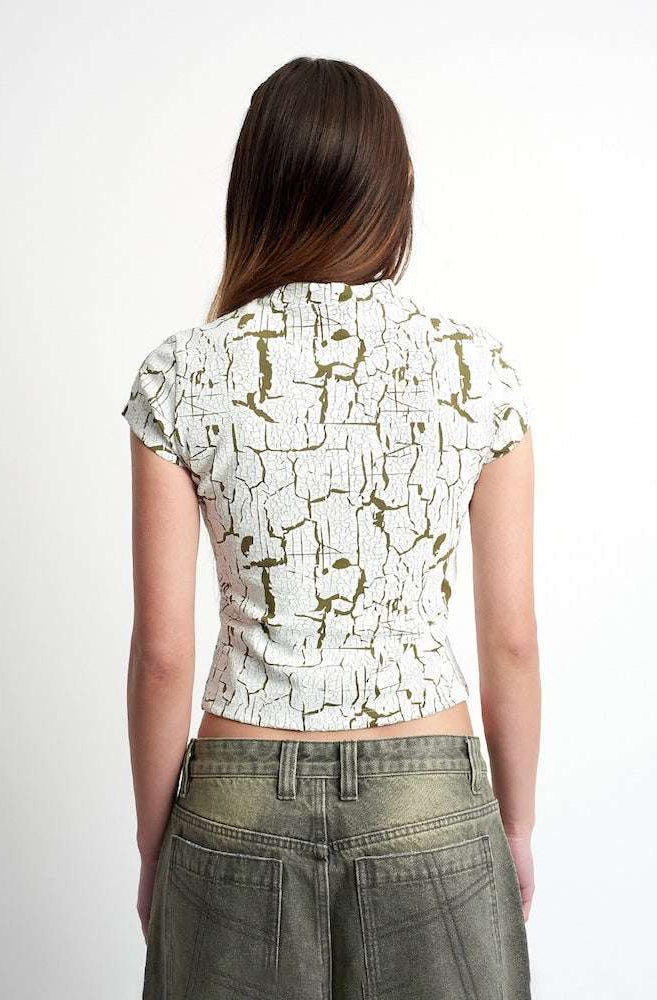 The Ragged Priest Rift Baby Tee Top by The Ragged Priest as seen on celebrities